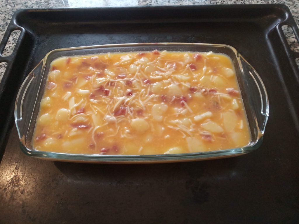 Tortilla de papas, jamón y queso al horno