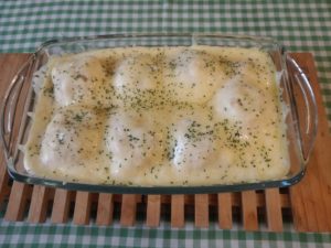 Lasaña de raviolis con salmón y quesos